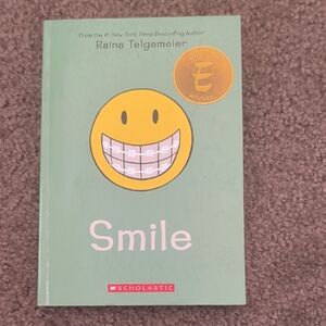 Scholastic Green 'Smile' Book with Yellow Emblem